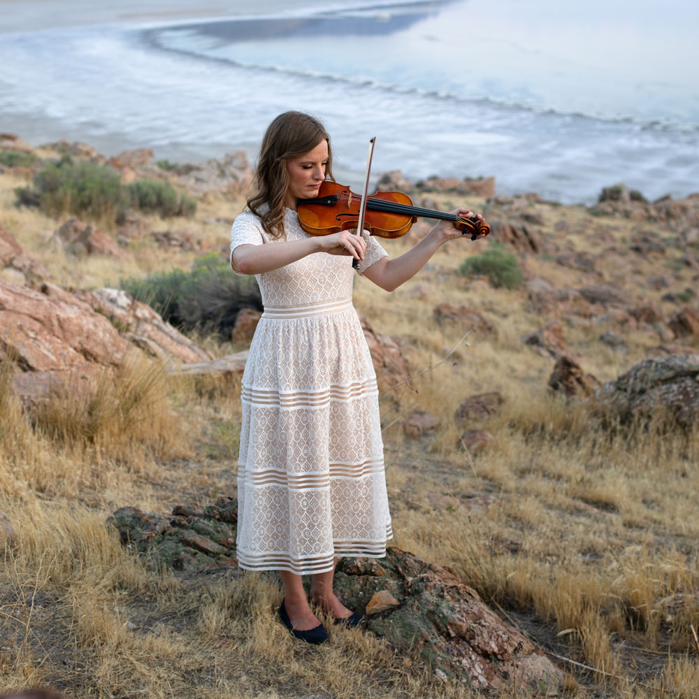 Kerstin Playing Violin Next to Water