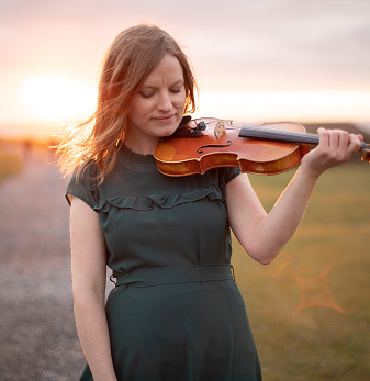 Kerstin in Dark Green Holding Violin